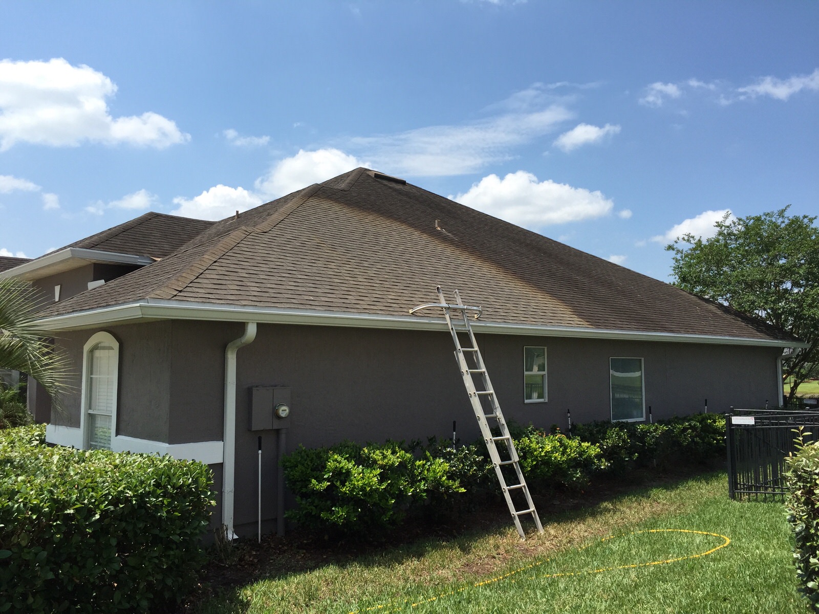 Asphalt Shingle Roof Cleaning In Progress