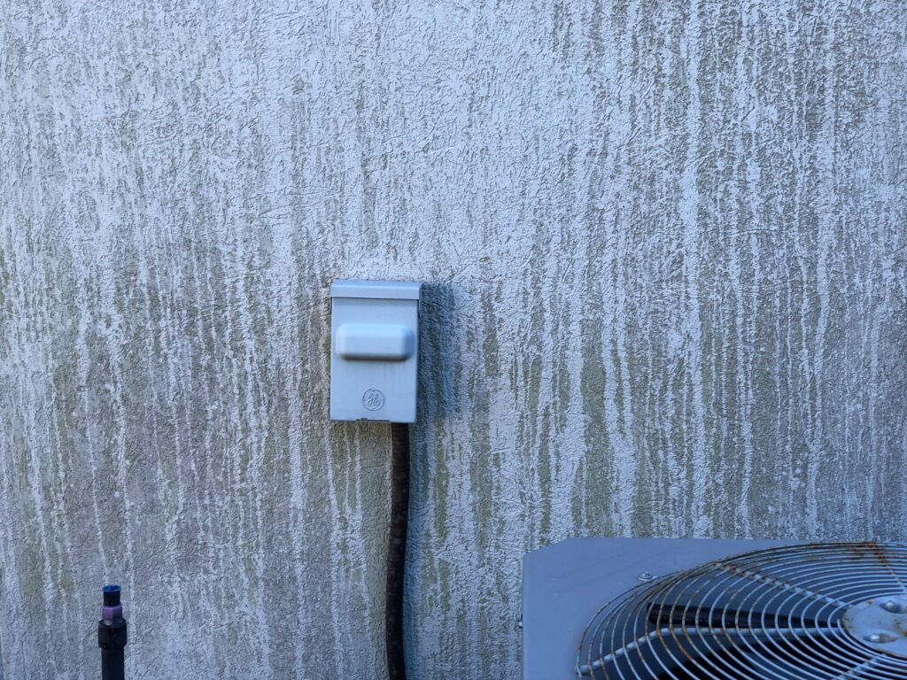 End result of exterior stucco wall if only having your soffits cleaned only