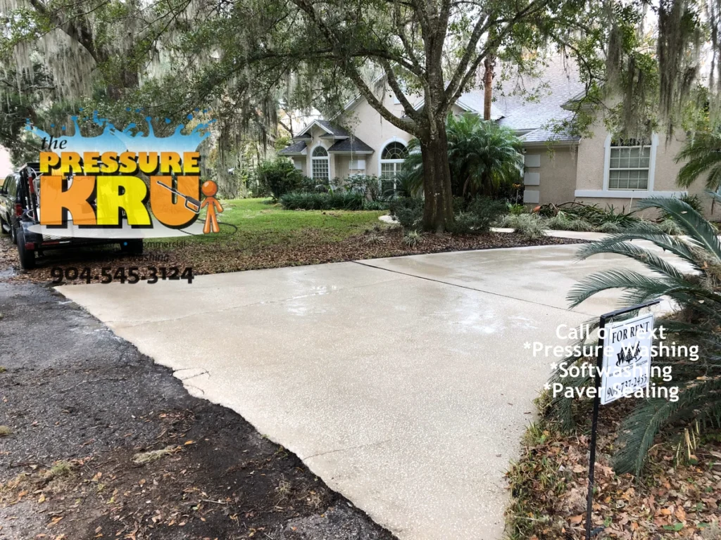 Image showing concrete driveway after pressure washing and chemical post treatment