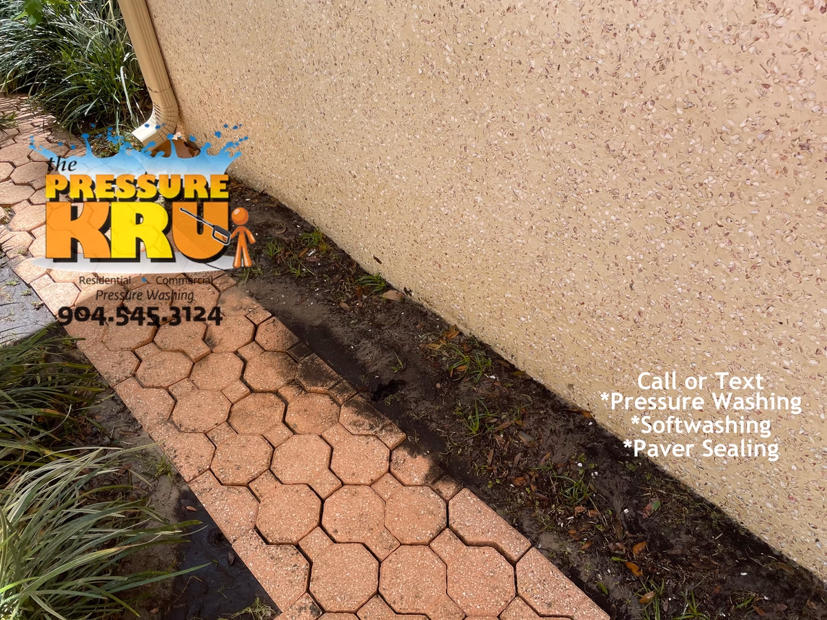 Soft wash coquina exterior in Orange Park Country Club after preserving natural stone finish