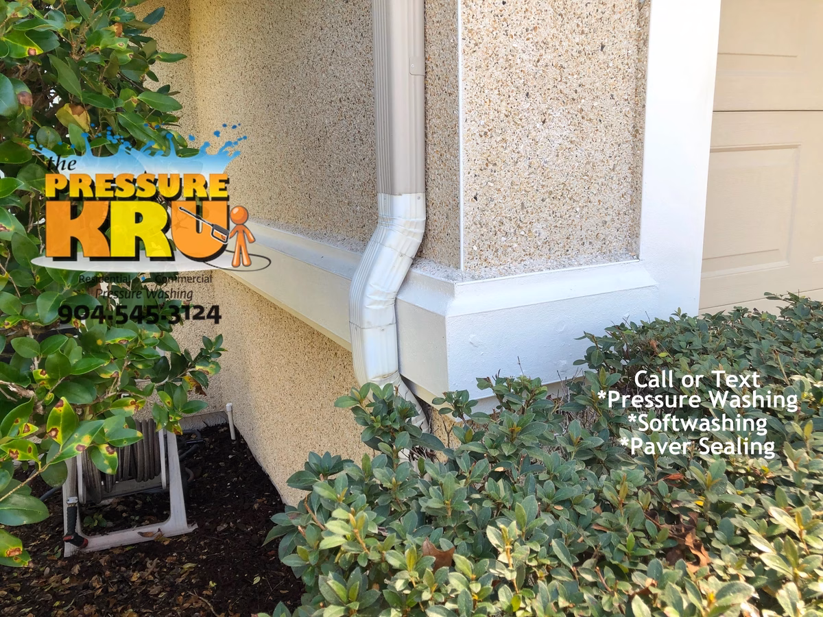 Professional coquina wall cleaning in Durbin Crossing after improving curb appeal