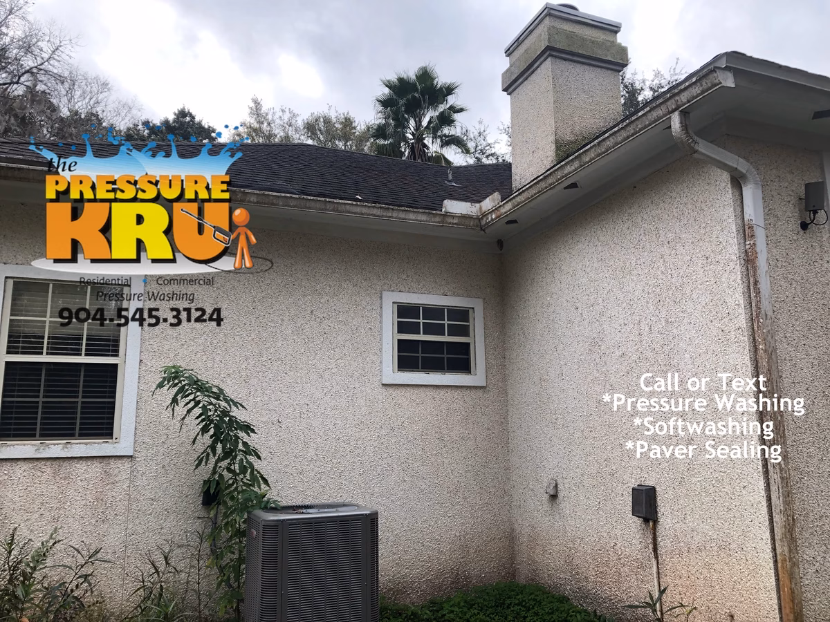 Coquina exterior restoration in Sawgrass neighborhood before gentle soft washing methods.