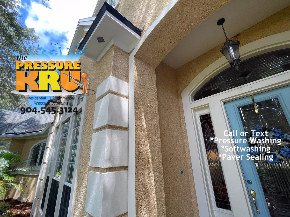 Coquina house washing in Queens Harbor after using safe low-pressure cleaning