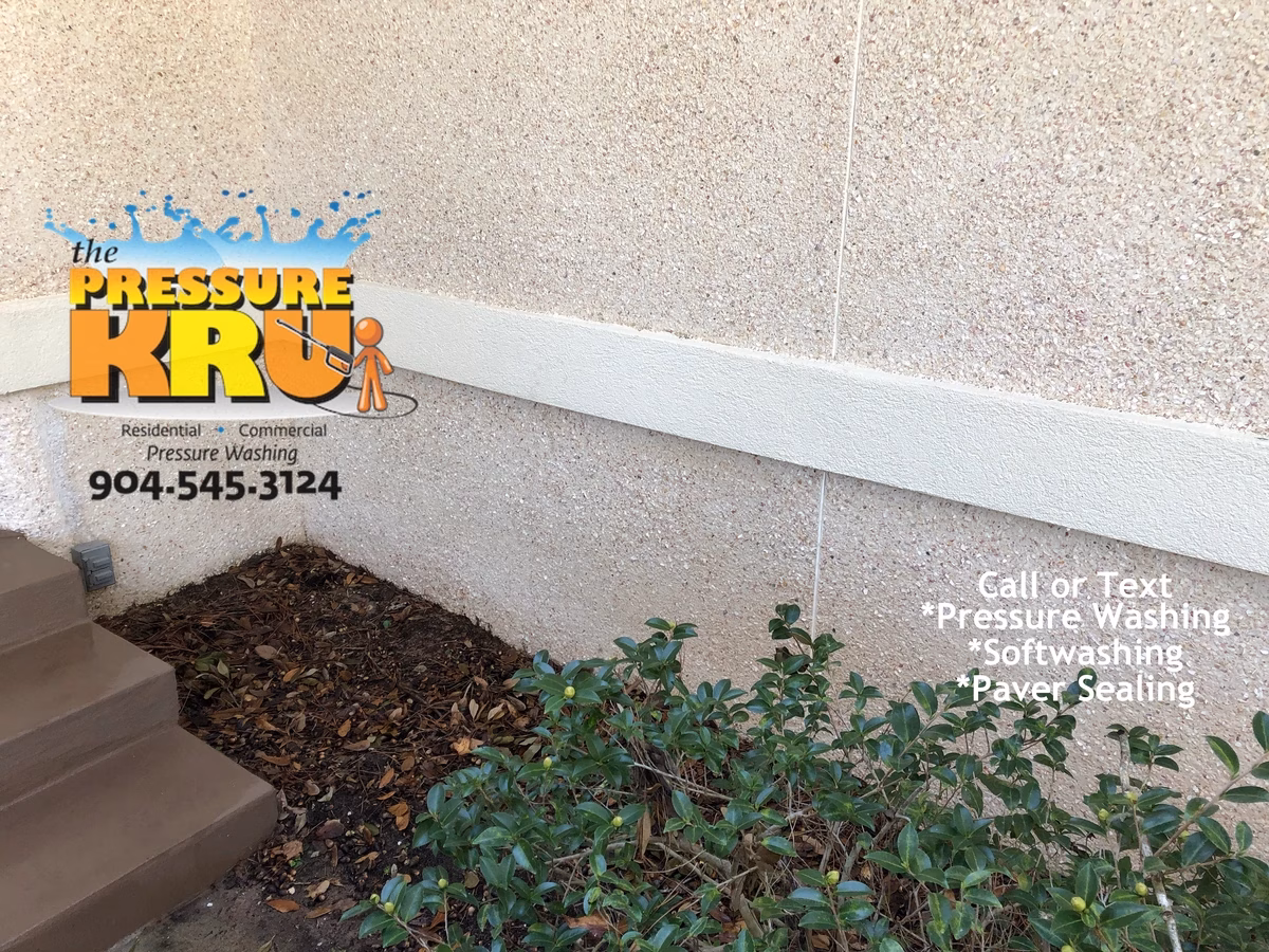 Coquina house washing in Cimarrone Golf & Country Club after removing green algae stains