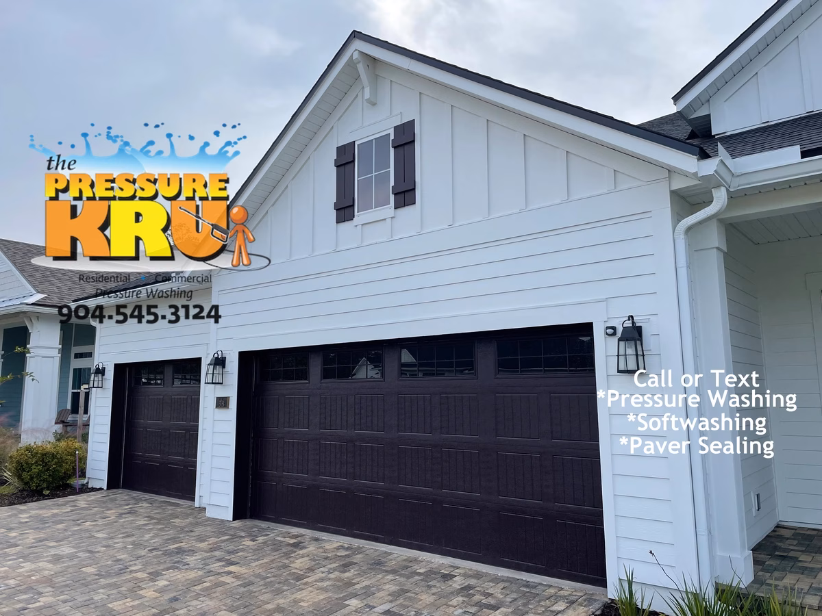 House washing service safely removing mold from siding and soffits in Shearwater neighborhood.