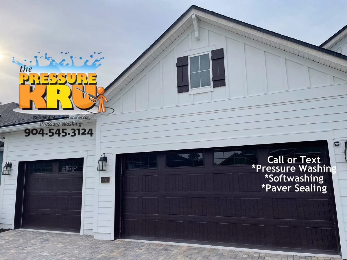 House washing service safely removing mold from siding and soffits in Shearwater neighborhood.