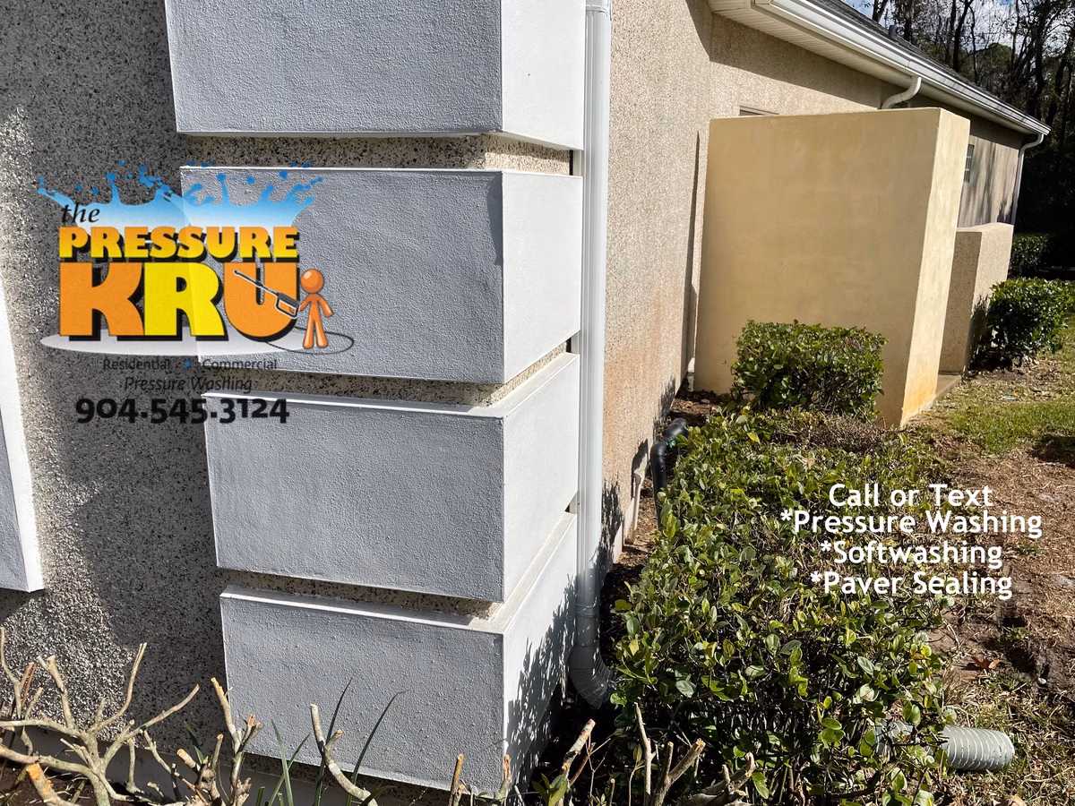 Professional coquina wall cleaning in Durbin Crossing after improving curb appeal