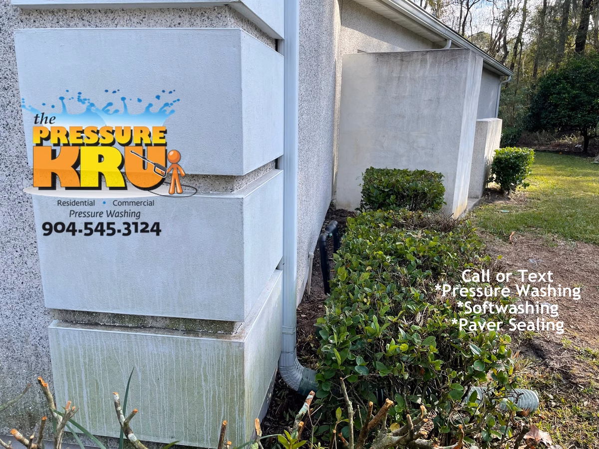 Professional coquina wall cleaning in Durbin Crossing before improving curb appeal