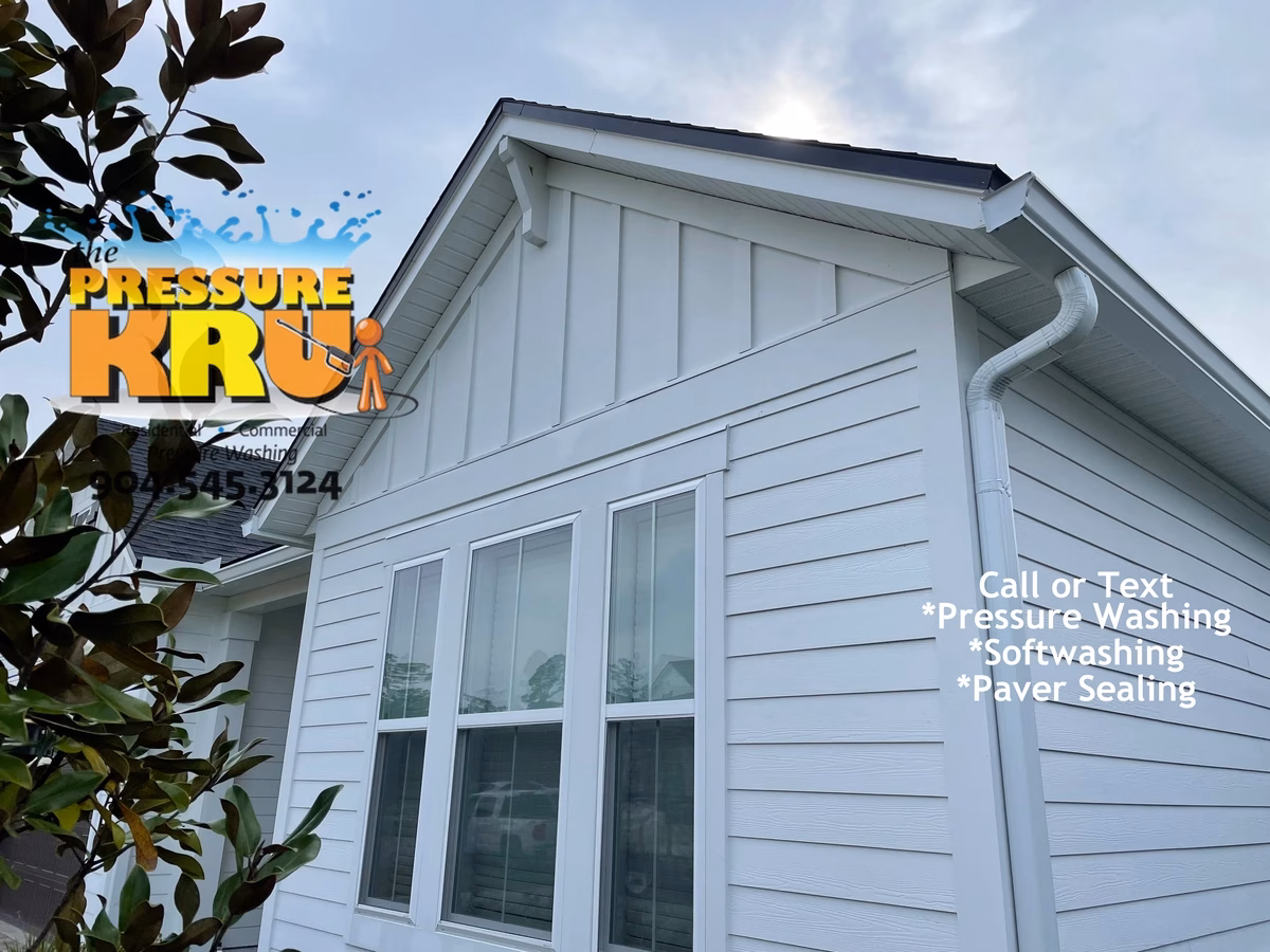 Professional House washing removes algae from siding in Beachwalk Neighborhood.