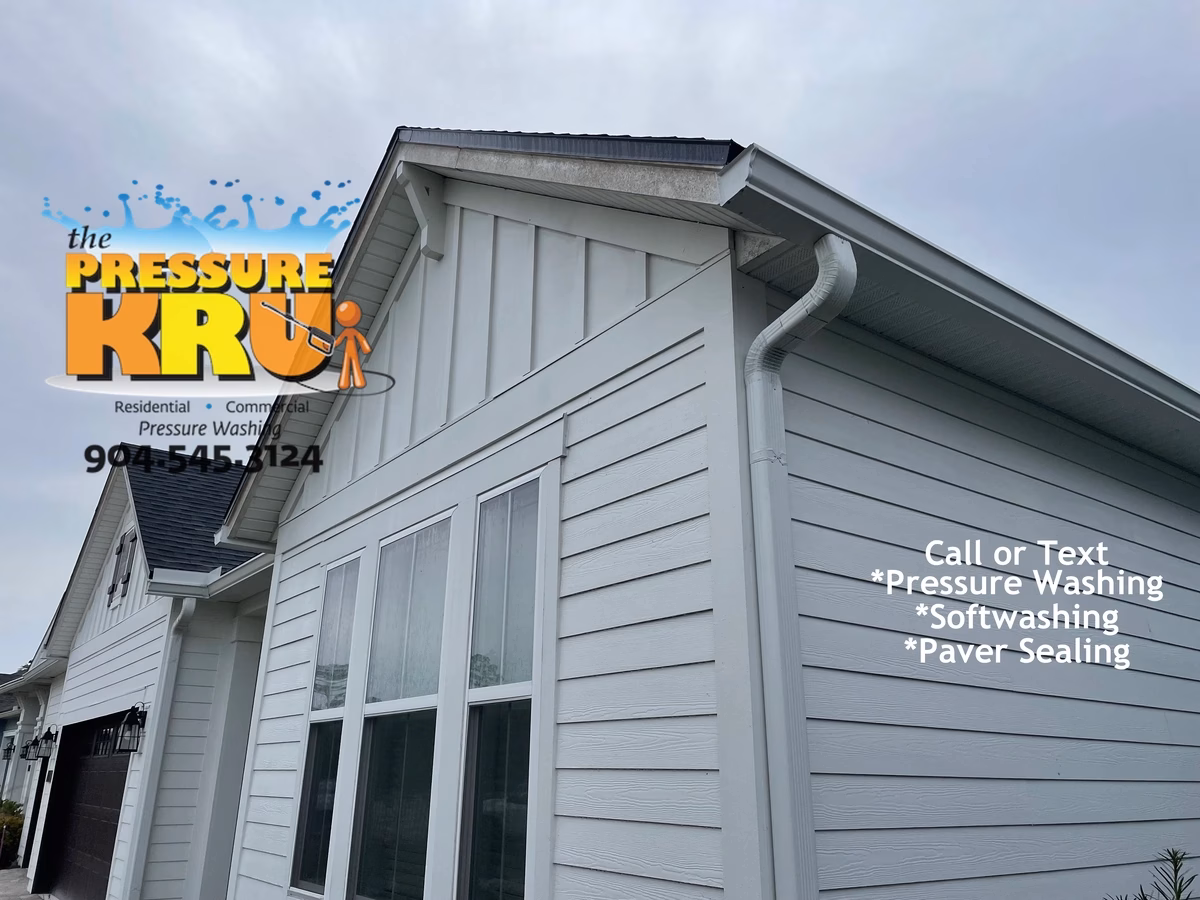 Professional House washing removes algae from siding in Beachwalk Neighborhood.