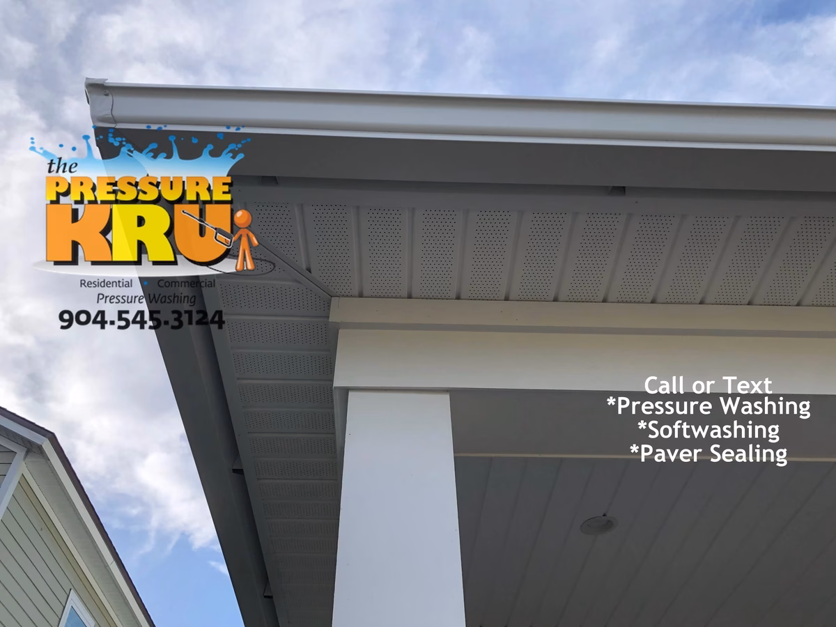 Professional House washing removes algae from siding in Beachwalk Neighborhood.