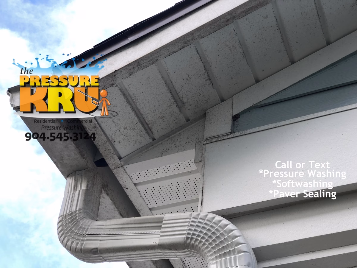 Before and after house pressure washing in St. Johns Golf and County Club.