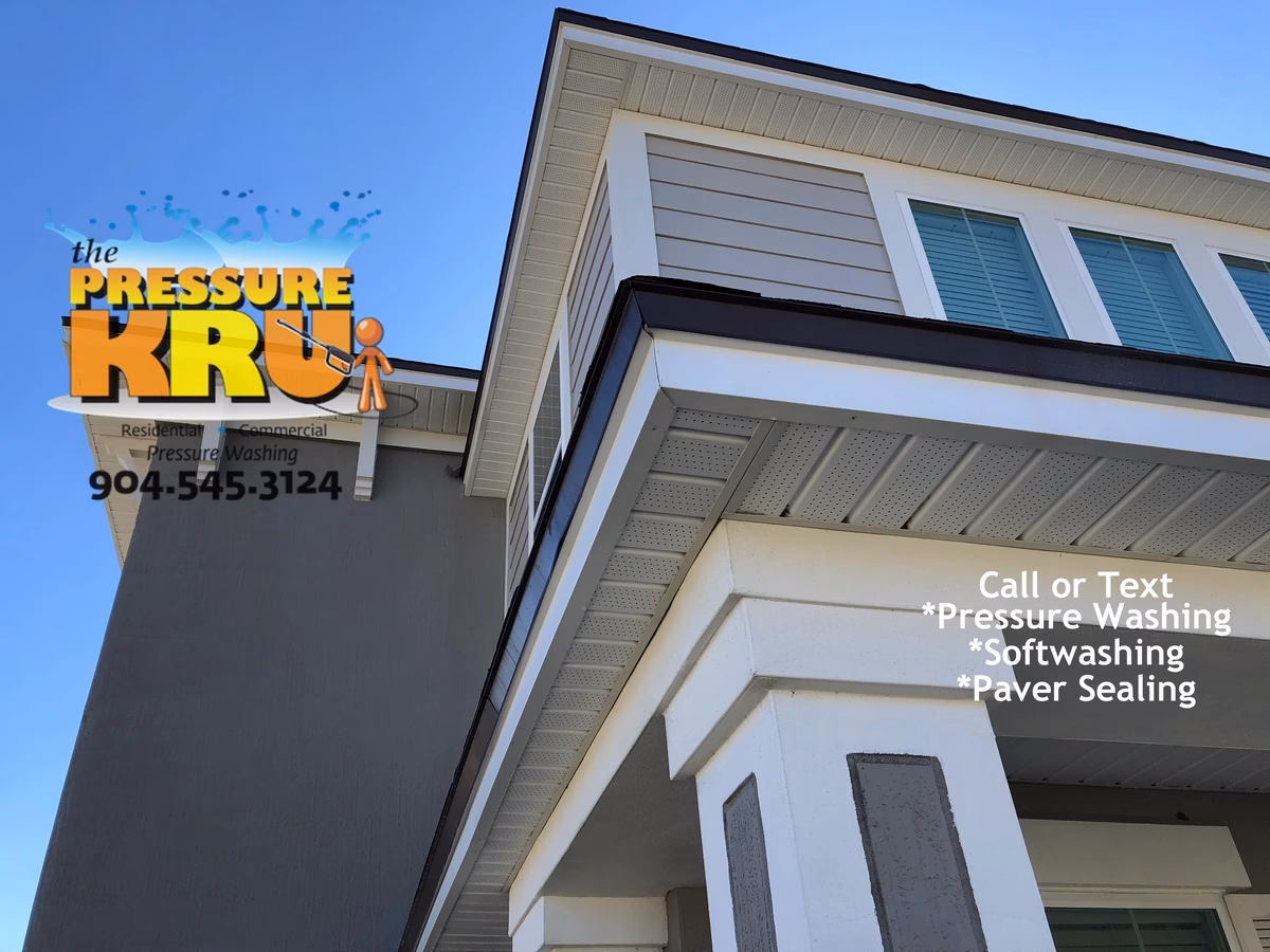 house washing contractor cleaning stucco siding in Bartram Park after softwash