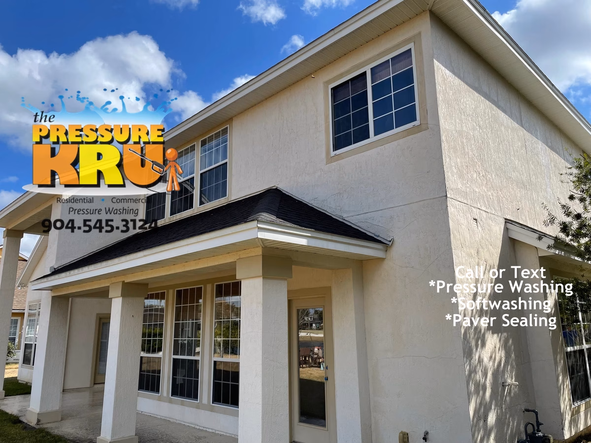 The pressure washing authority for stucco cleaning this home in St Johns Golf and country Club.