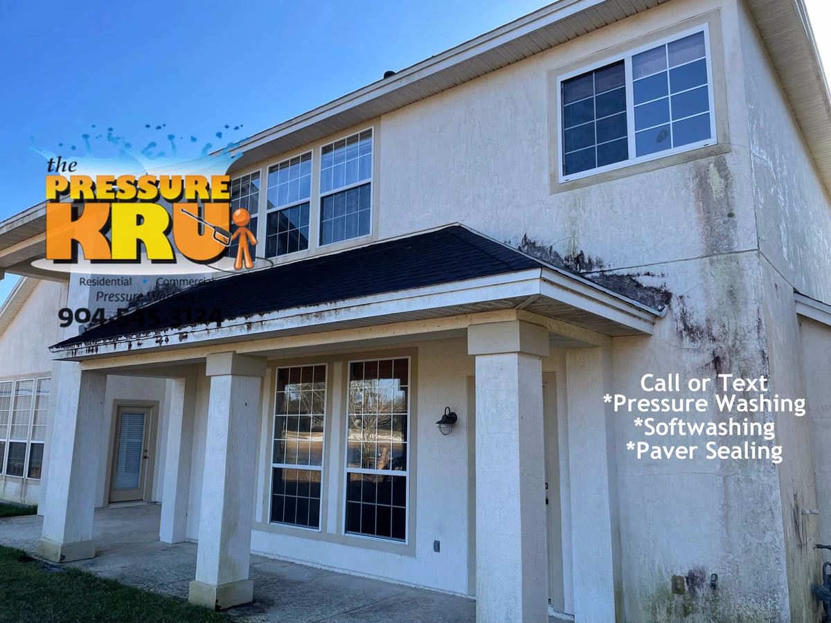 The pressure washing authority for stucco cleaning this home in St Johns Golf and country Club.