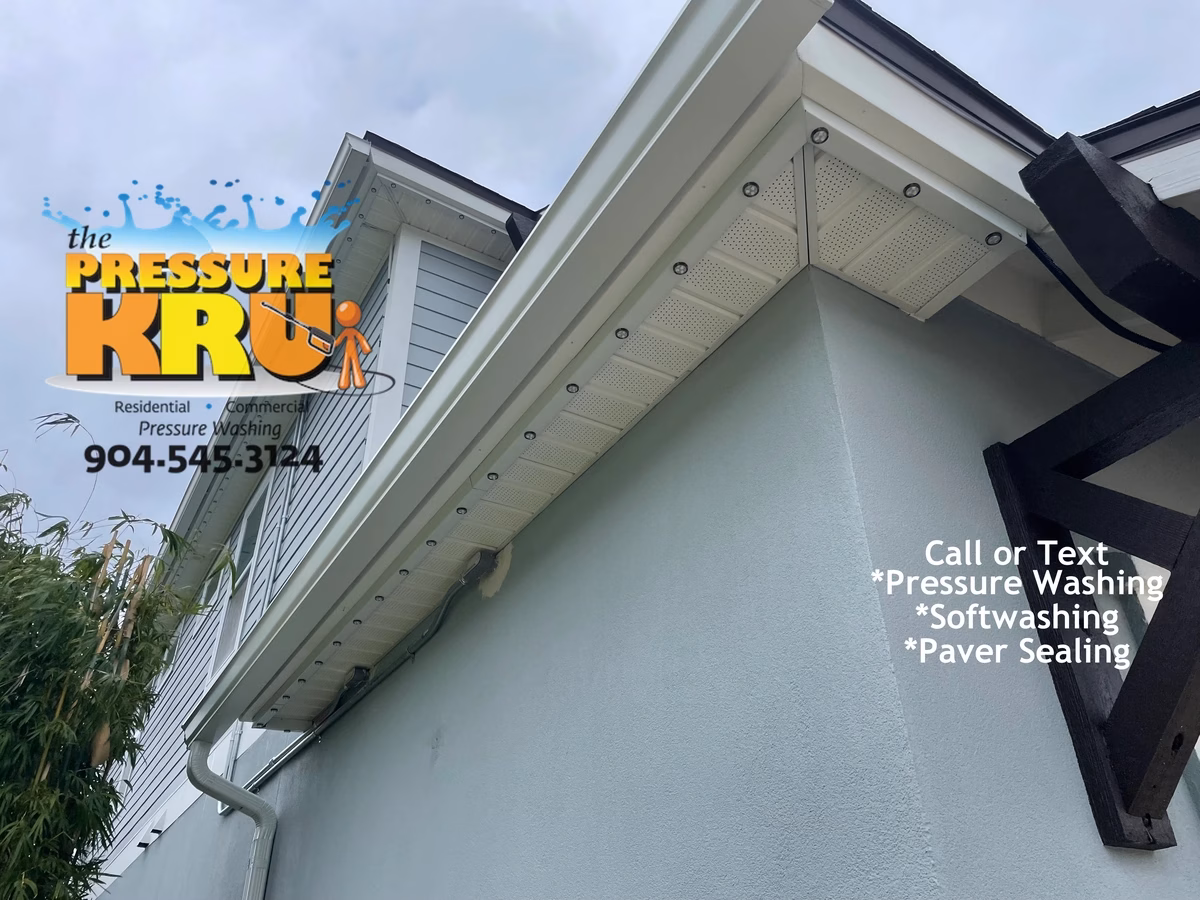 Soft washing home exterior in Julington Creek Plantation neighborhood removing algae.