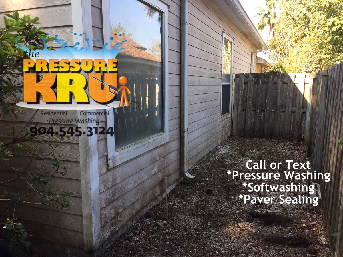 Professional house washing removes algae from siding and vinyl in Durbin neighborhood.