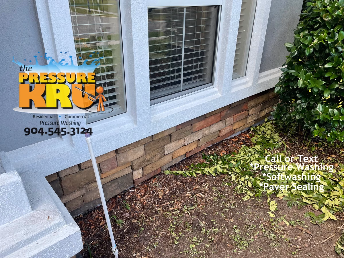 after Mold and algae removal from a stucco home's exterior in Jacksonville FL