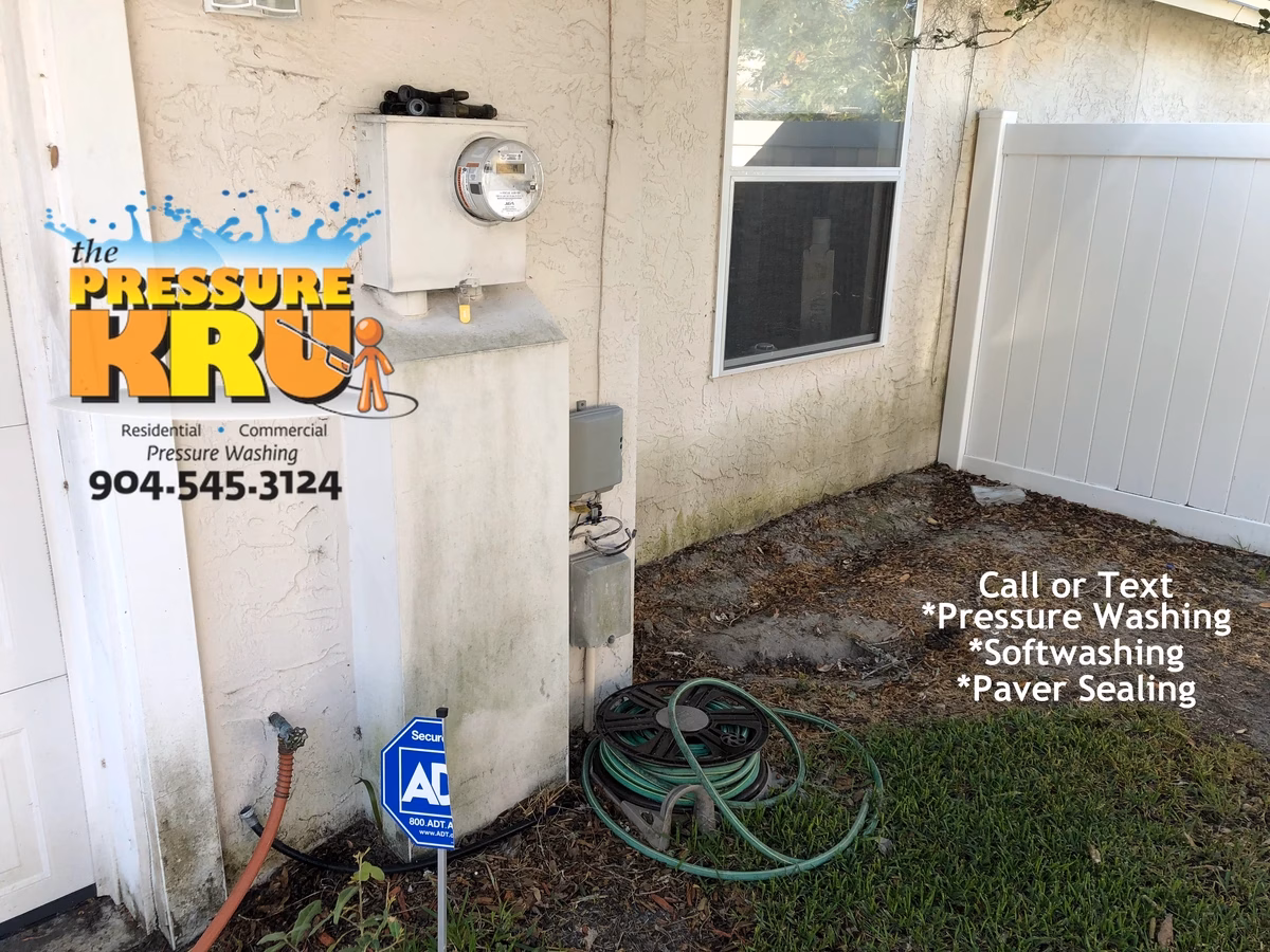 Before Professional soft washing restores stucco home in World golf Village