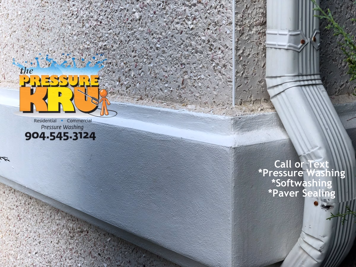 Residential professional coquina home exterior cleaning in Lochrane neighborhood in Orange Park Country Club. After cleaning the intricate details.
