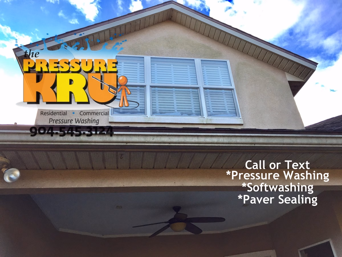 Before Exterior stucco house washing service for a Florida home