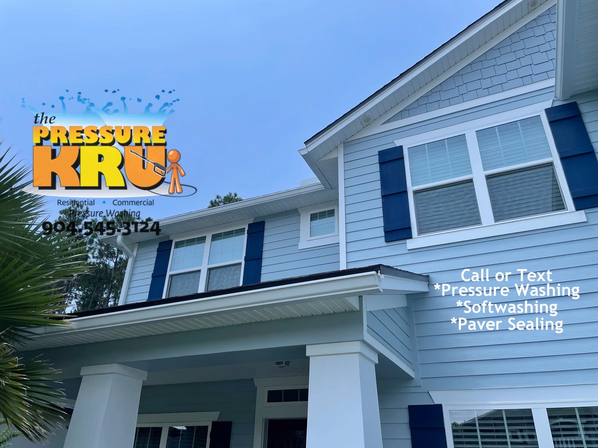 Professional House washing removes algae from siding in Silver Leaf Neighborhood.