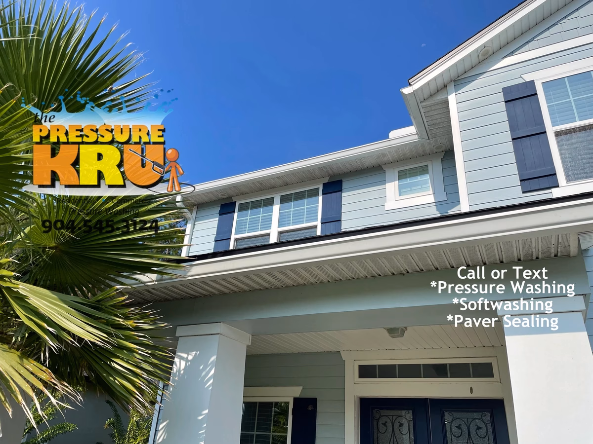 Professional House washing removes algae from siding in Silver Leaf Neighborhood.