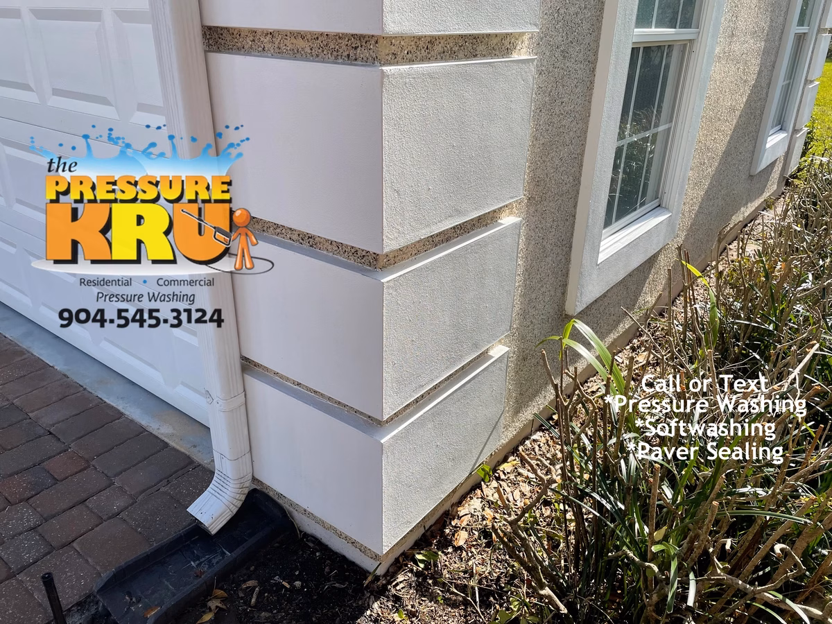 Coquina home exterior cleaning in Orange Park Country club after removing black streaks and mildew.