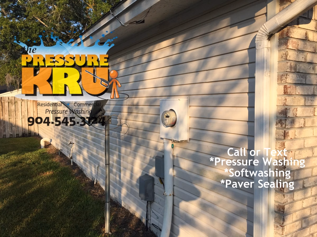 Exterior vinyl siding before house washing in Switzerland area.