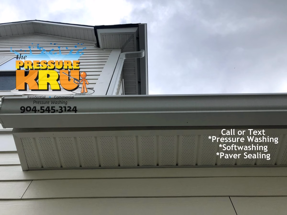 Before and After house washing in Shearwater neighborhood safely removing mold and algae.