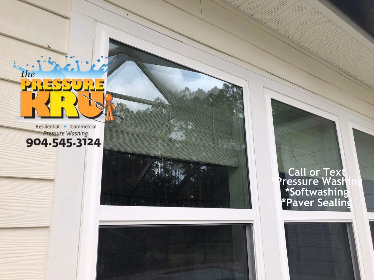 Exterior House Washing home in South Hampton neighborhood removing dirt and mold without damaging window seals.