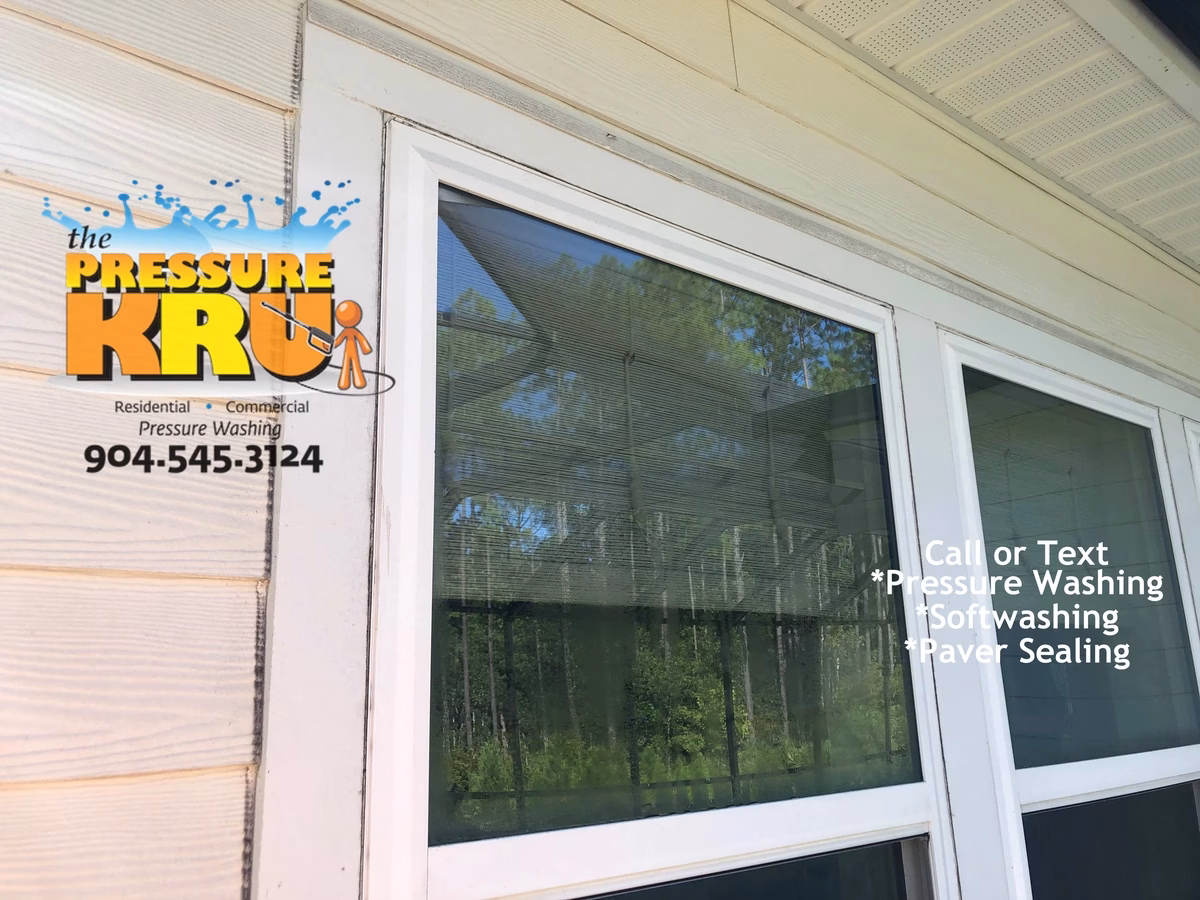 Exterior House Washing home in South Hampton neighborhood removing dirt and mold without damaging window seals.