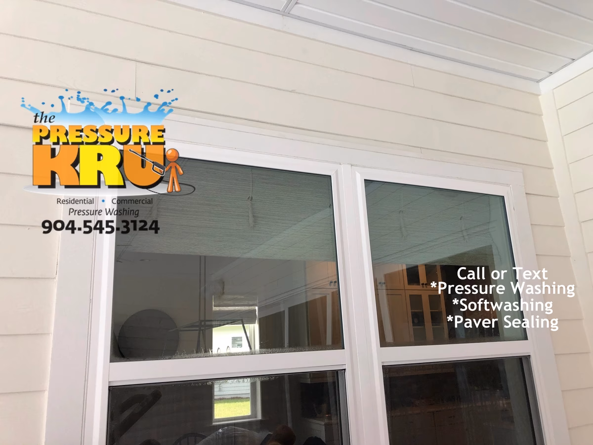 Exterior House Washing home in South Hampton neighborhood removing dirt and mold without damaging window seals.