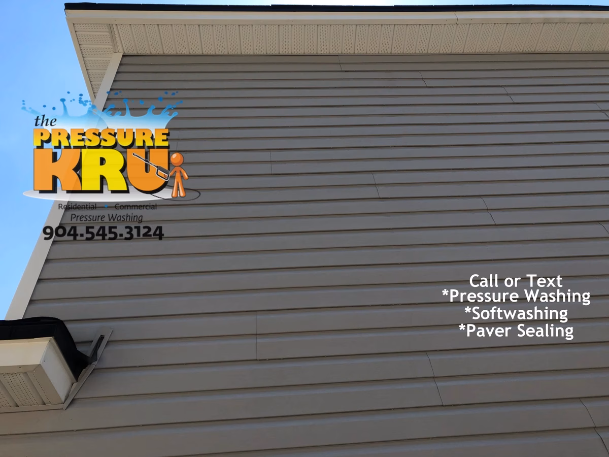 Two-Story Vinyl Siding Exterior house wash for a Greenland Chase home after.