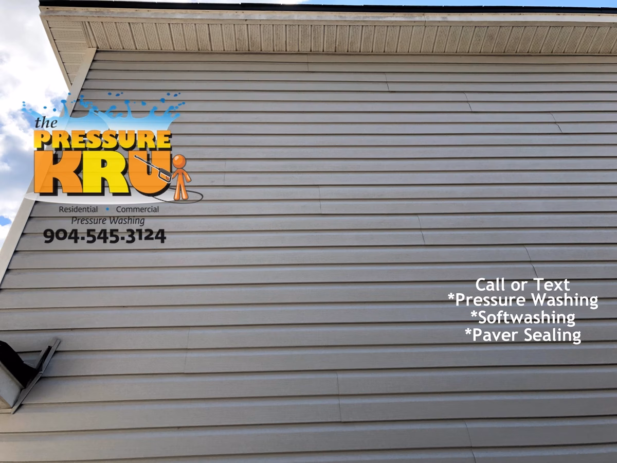 Two-Story Vinyl Siding Exterior house wash for a Greenland Chase home before.