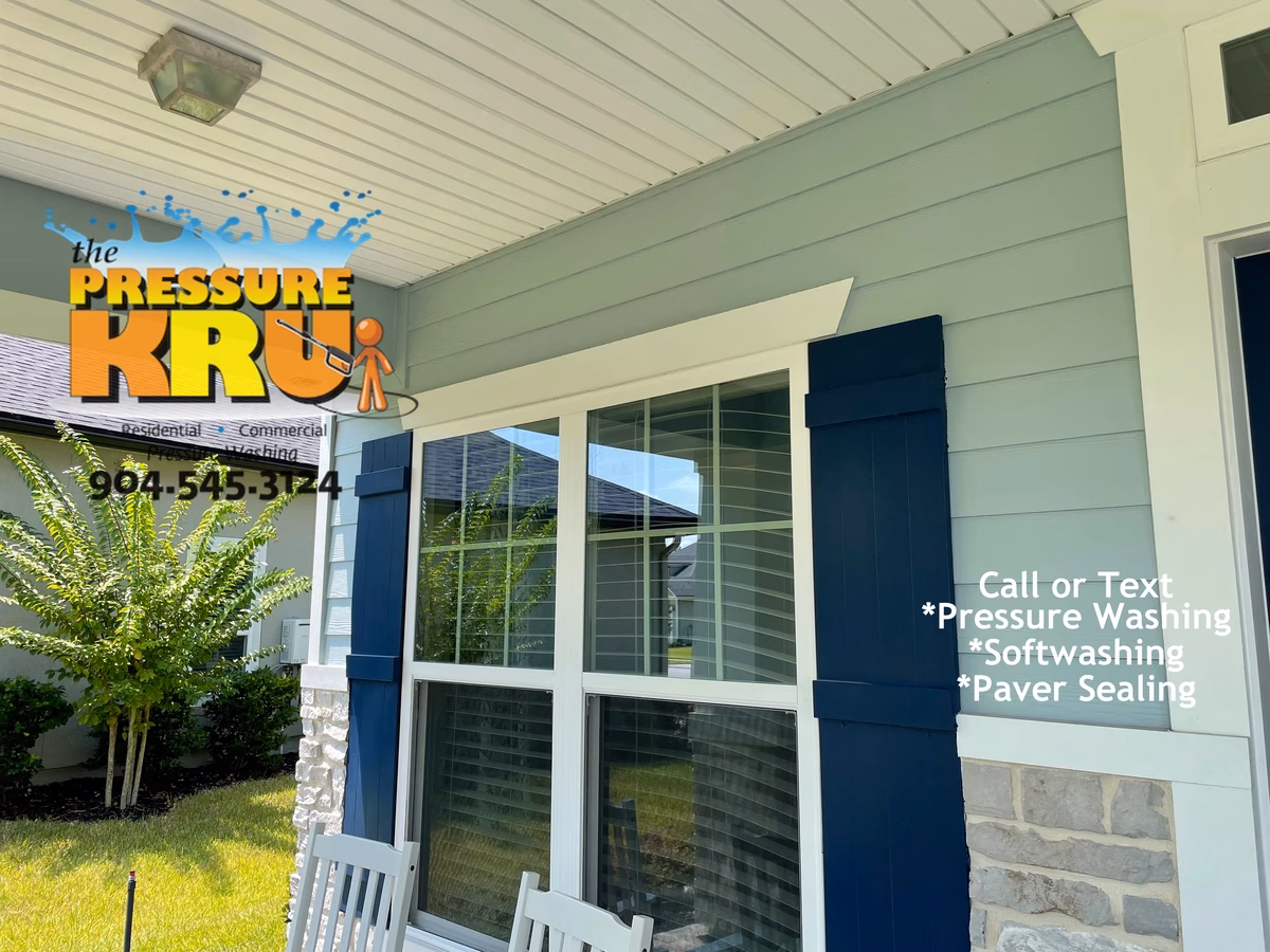 Safely removing dirt and mold from home exterior in Durbin neighborhood.