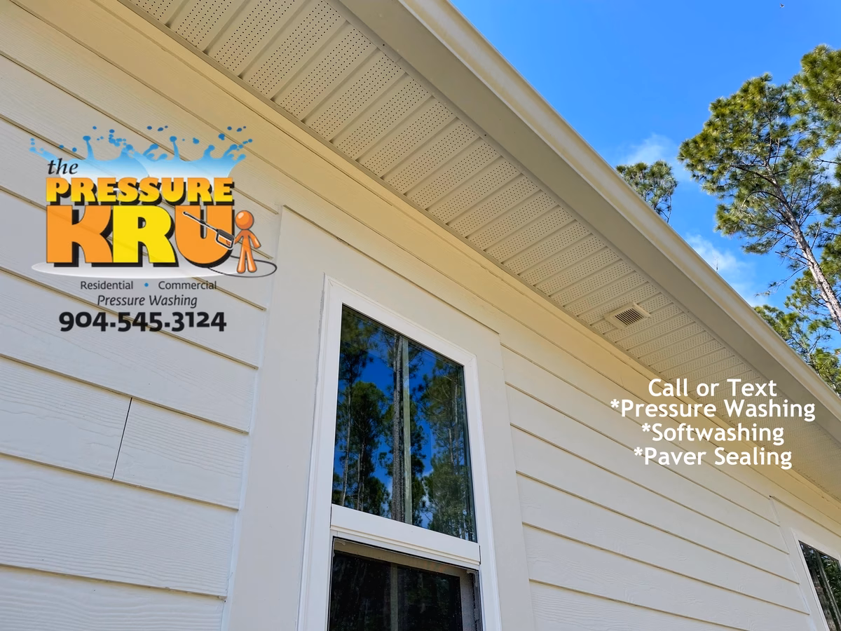 Before and after soft washing siding in The Preserve at St. Johns neighborhood restoring to like new condition.