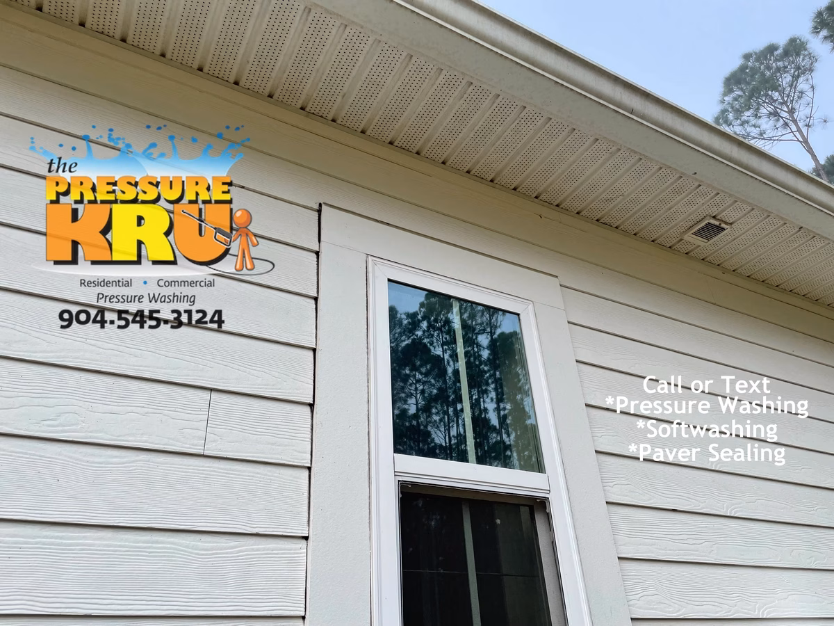 Before and after soft washing siding in The Preserve at St. Johns neighborhood restoring to like new condition.