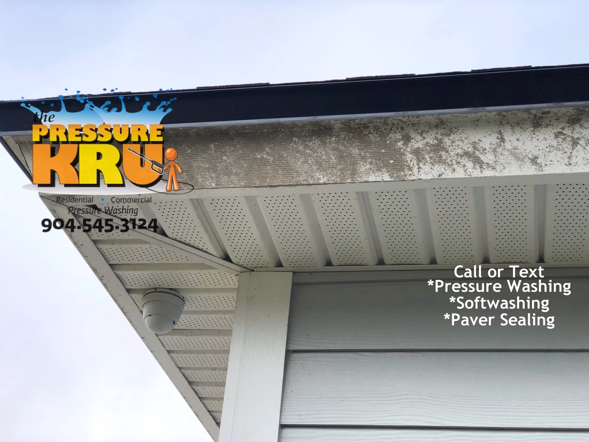 Before and after Softwashing home in Greenland Chase Neighborhood safely removing grime.