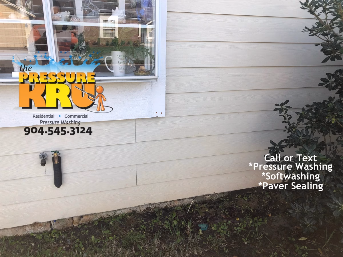 Before and after house washing in World Golf Village neighborhood removing algae from exterior.
