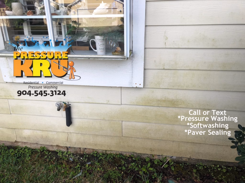 Before and after house washing in World Golf Village neighborhood removing algae from exterior.