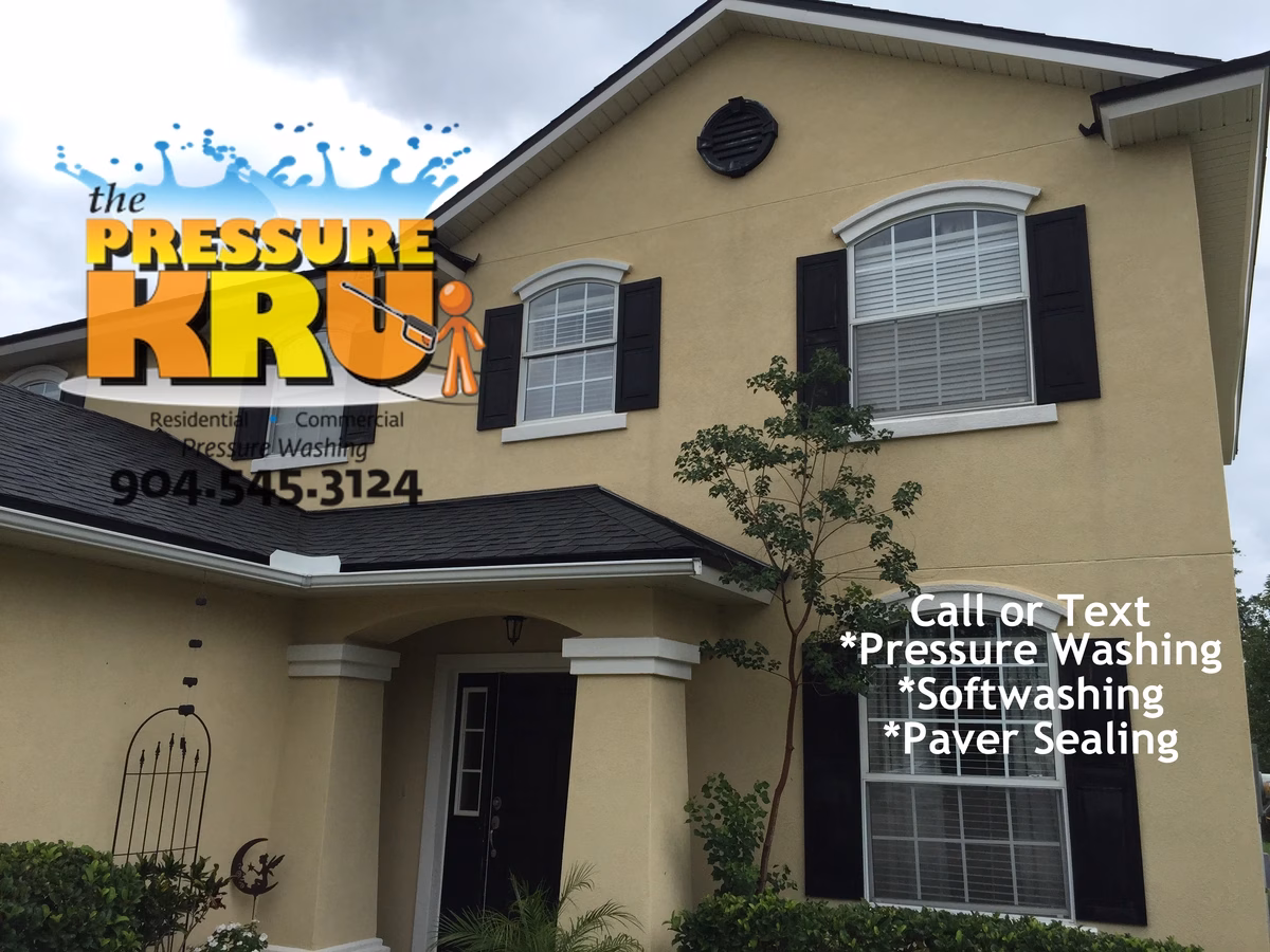 Soft washing service safely cleans two-story stucco home in Aberdeen after washing.