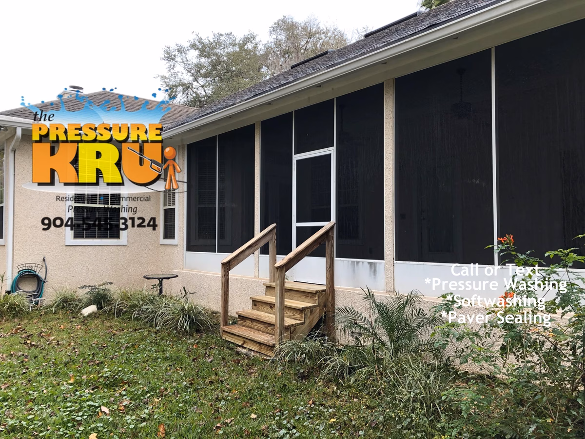 Professional coquina exterior home cleaning in Sawmill Lakes after organic growth removal.