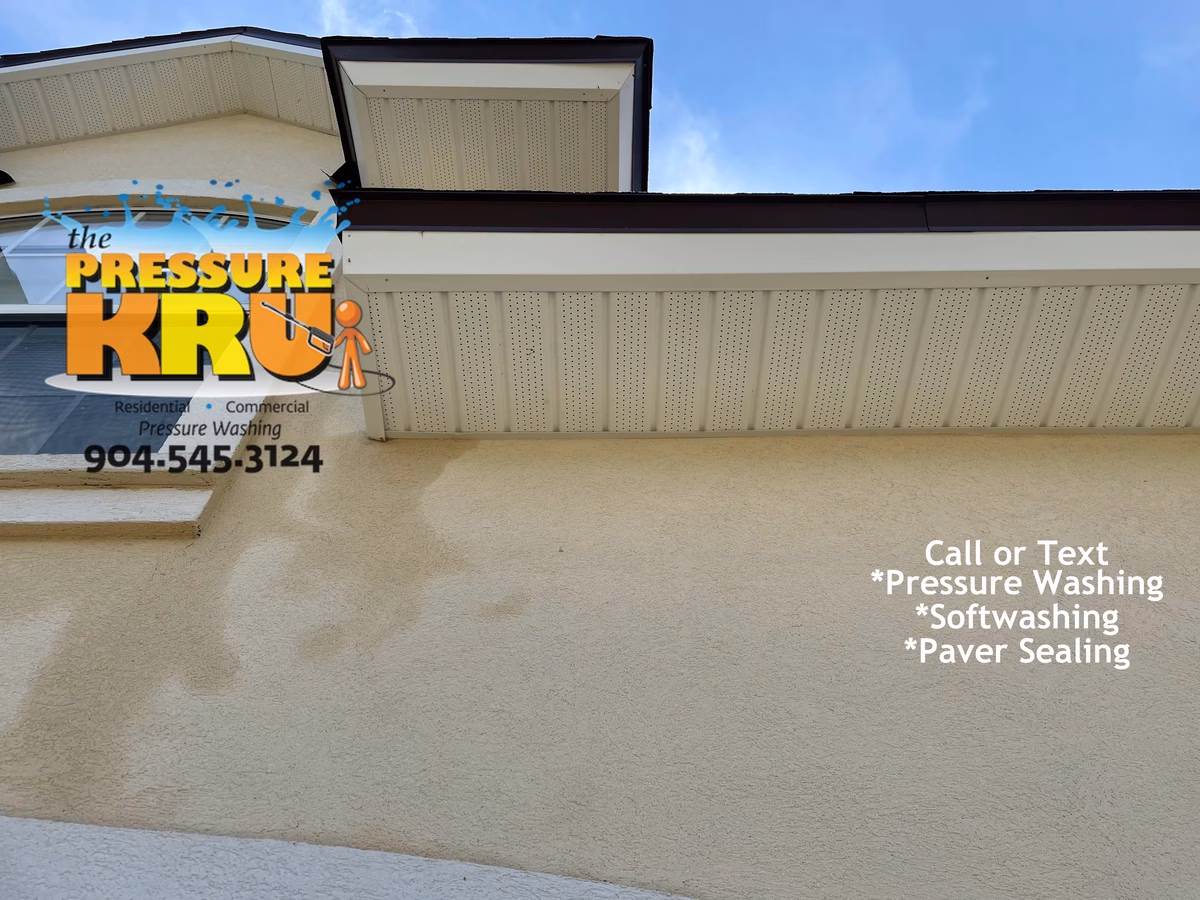 Exterior house washing service improves the appearance on stucco home while removing bug nests in Plantation Estates after cleaning.