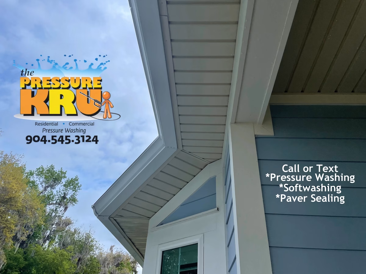 Professional pressure washing home exterior in Durbin neighborhood safely removing grime.