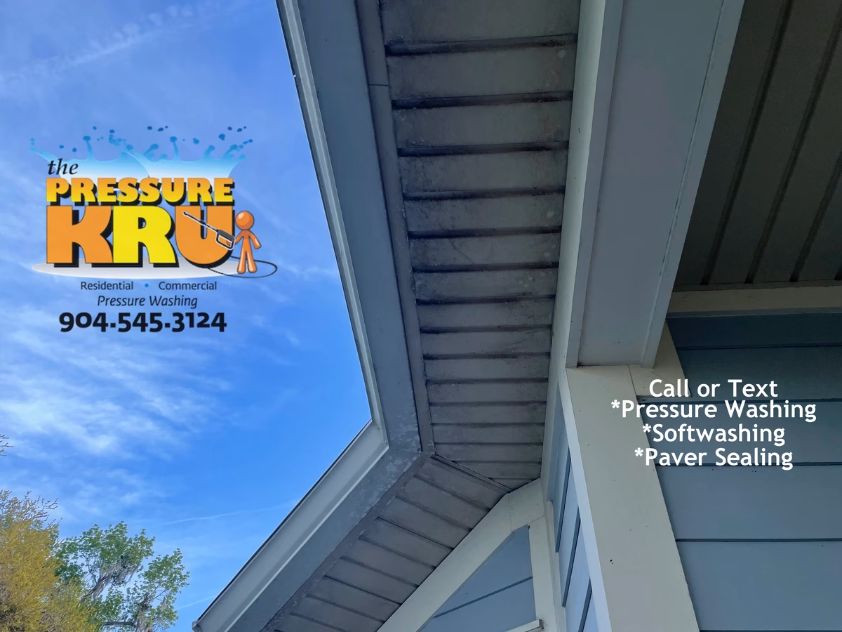 Professional pressure washing home exterior in Durbin neighborhood.