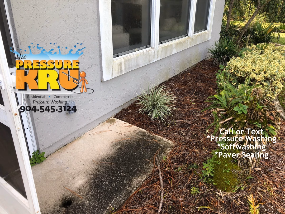 Stucco home before exterior cleaned using safe soft wash methods in Cimarrone neighborhood.