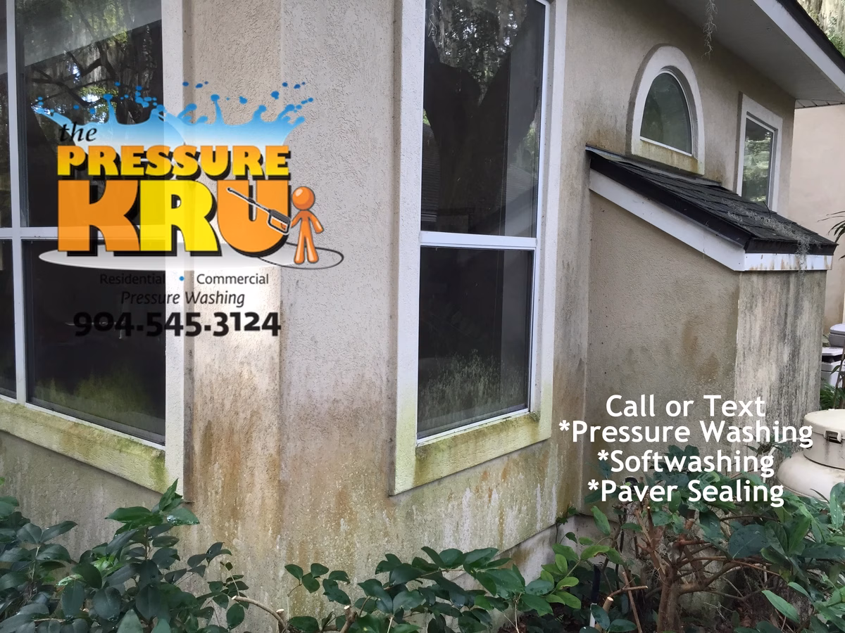 Stucco home exterior before house wash in Julington Creek.