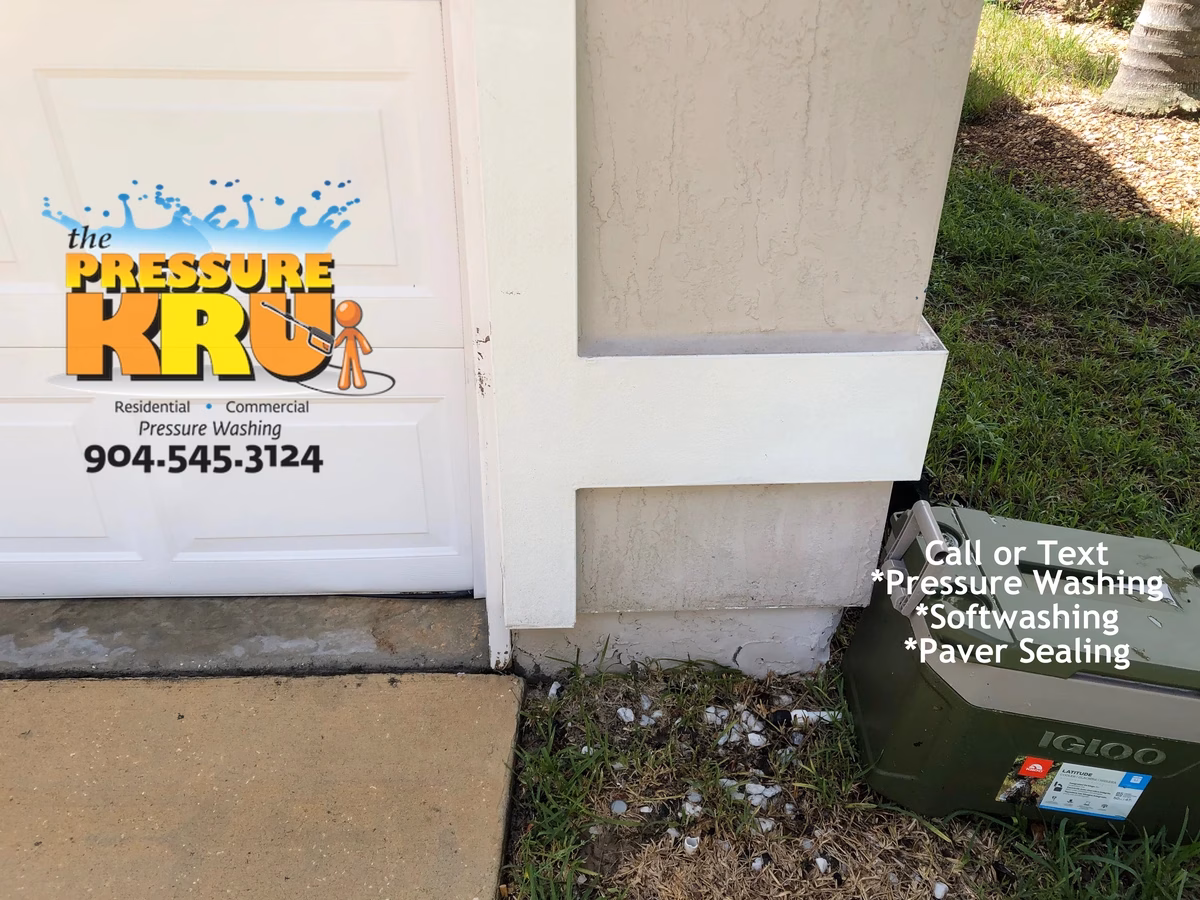 Cleaning stucco exterior after soft washing in Baymeadows Jacksonville.