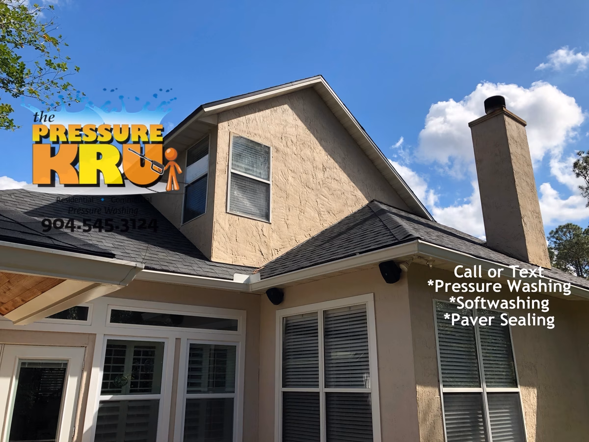 Two-Story Residential exterior after soft washing service for stucco home in Jacksonville FL.